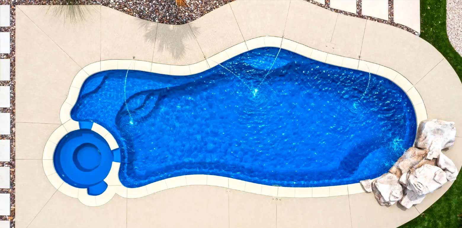 AVIVA Pools Serene freeform fiberglass pool and spa from AquaPools