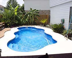 Builder Fiberglass Pool Contractor Fair Haven Texas Caldwell Aqua Inground Swimming Pools Installer that creates a private water oasis