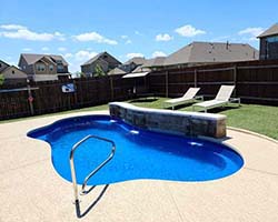 Installer Inground Swimming Pool Contractor Tera Vista Texas Tanglewood Fiberglass Pools Builder of pristine private backyard water park