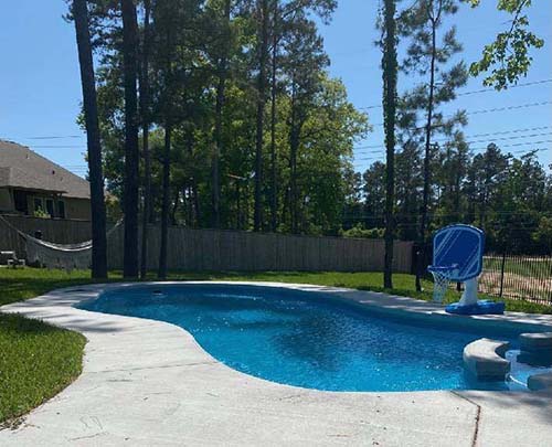 Build install contractors Aqua Pool custom fiberglass pools Conroe 77301. Companies best luxury inground pool 77507 with special low prices.