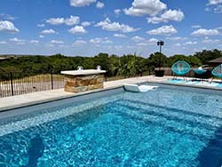 Install, design, and build Small Fiberglass Pool Manor Creek, Texas. Contracting companies Aquapools plunge swimming pools McQueeney, Tx. 78123.