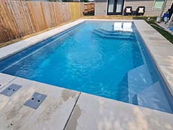 Build company spool fiberglass swimming pool Oak Creek, Texas. Aquamarine design install contractor inground pools River Chase, Tx. 78130 at cost prices.