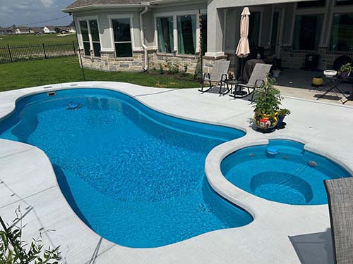 Aquapools contractor inground spool pool installer Alamo Heights, Texas. Cross Mountain fiberglass swimming pools design build special cost concrete companies.