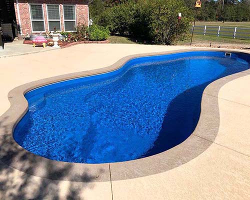 Aquamarine inground swimming pool contractor Highland Texas. Live Oak design build small fiberglass spool pools install companies special discount prices.