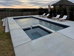 Aquamarine install prefab fiberglass pool Timberwood Park, Texas. Inground swimming pools Adam Hills special prices by design build contracting companies.